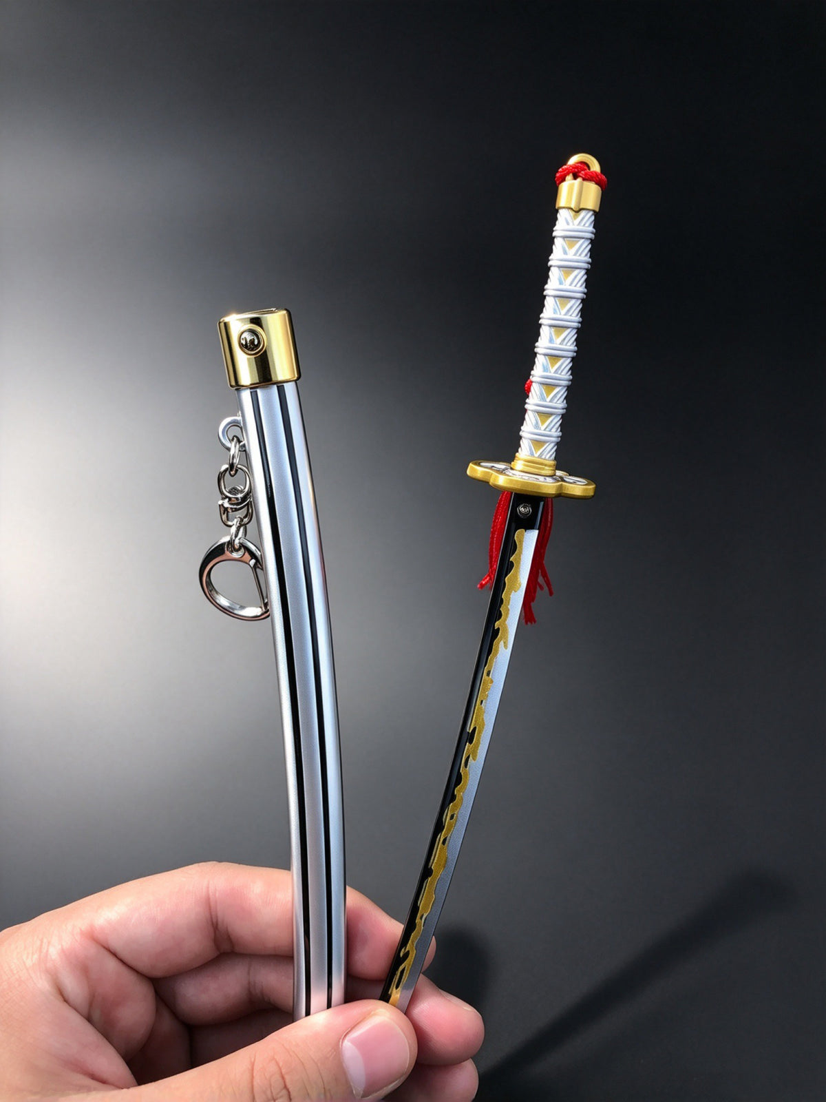 YP Katana Zenitsu Agatsuma Nichirin sword keychain drawn from silver scabbard showing lightning blade