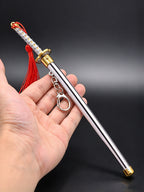 YP Katana Zenitsu Agatsuma Nichirin sword keychain drawn from silver scabbard showing lightning blade